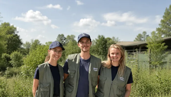 Heidi, Eddie, and Hannah, bison rangers standing in their uniforms.