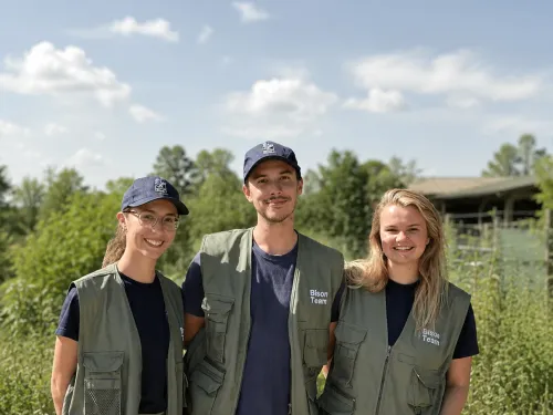 Heidi, Eddie, and Hannah, bison rangers standing in their uniforms.